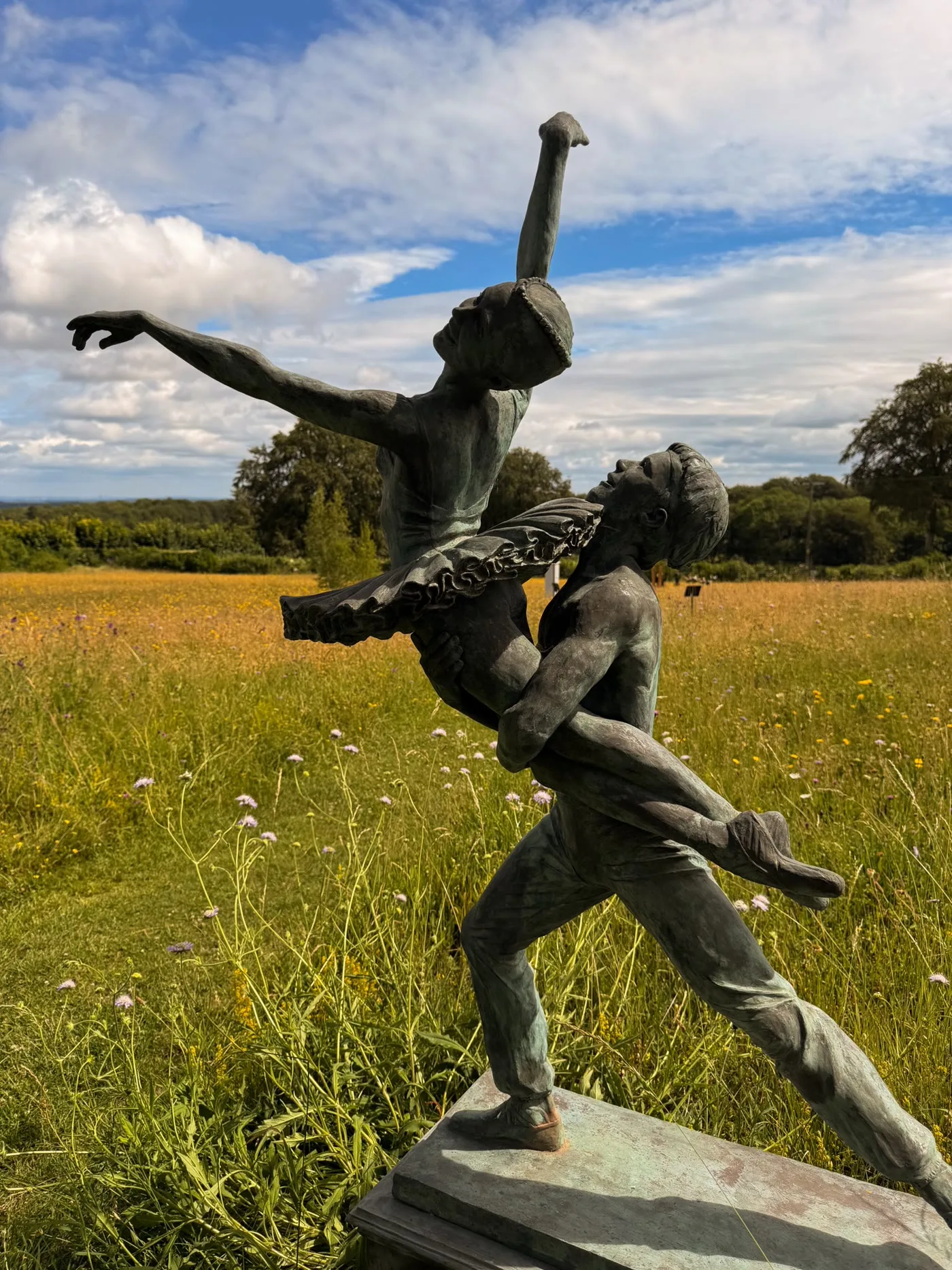 Ballet dancer sculptures among the vines at High Clandon