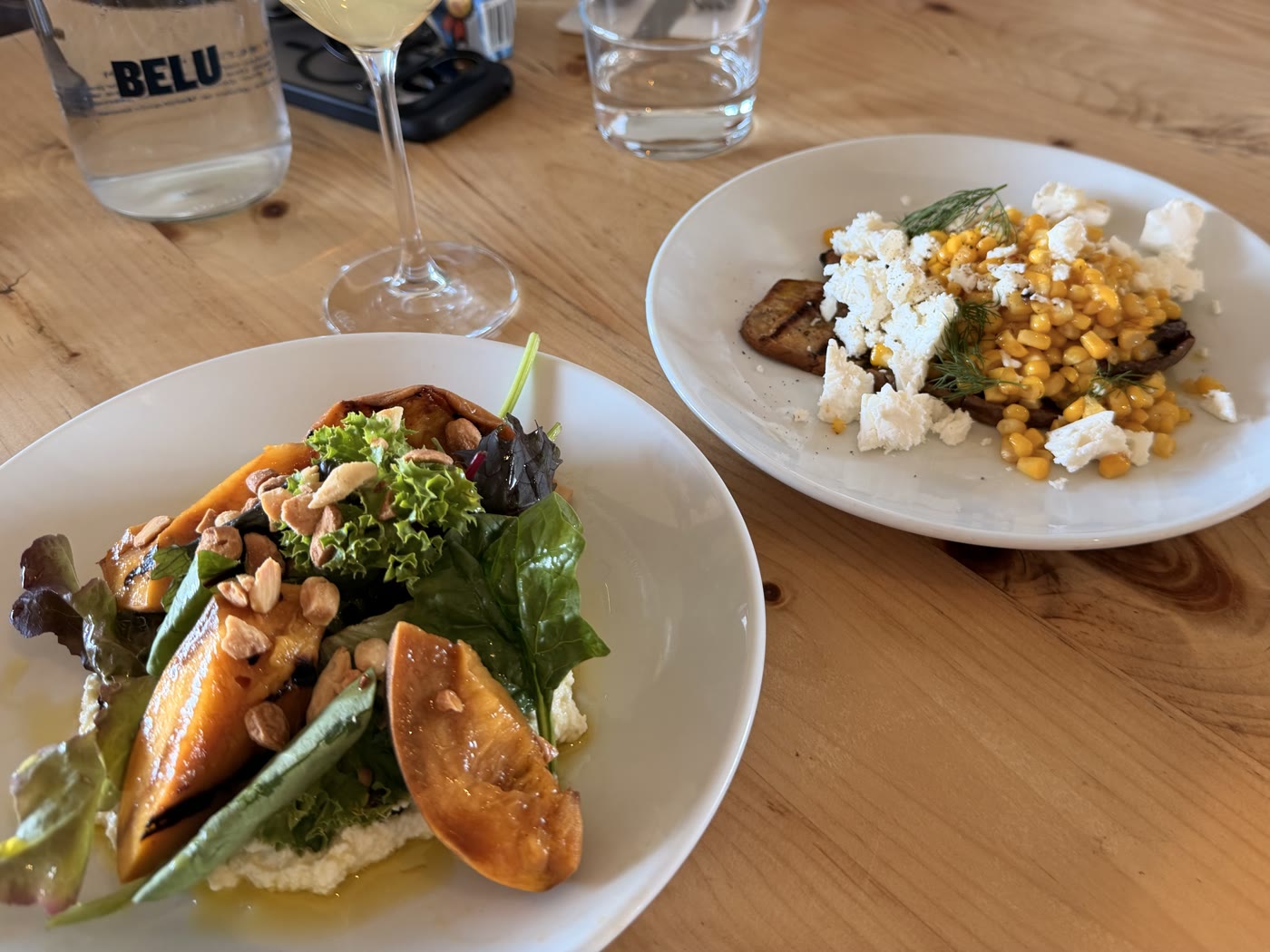 Grilled peaches with sheep’s cheese and charred aubergine with sweetcorn and feta at Kinsbrook’s restaurant